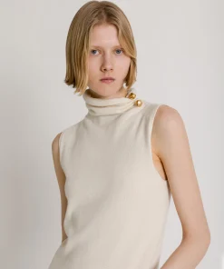 Top dolcevita in lana, seta e cashmere con spilla gioiello